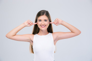 Fototapeta premium Female teenager covering her ears