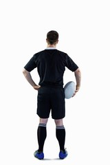 Rugby player holding a rugby ball
