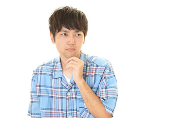 Obraz premium パジャマ姿で寛ぐ男性
