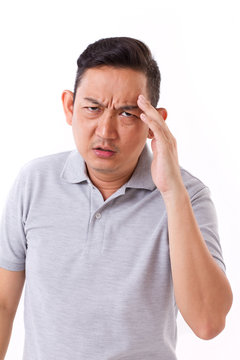 sick, stressful man suffering from headache, migraine