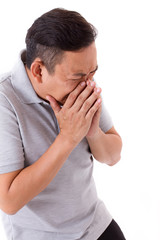 sick man sneezing