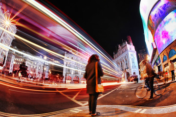 Obraz premium Busy Piccadilly Circus in London by night, England, UK