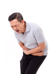 Obraz premium asian man suffering from stomachache, constipation, indigestion,