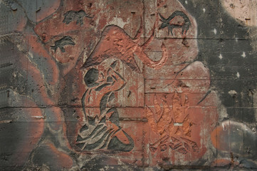 The picture on the wall/Graffiti pattern primitive man and animal in ethnic style

