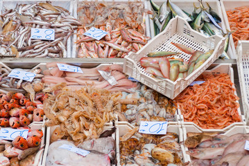 Fototapeta premium Crates full of seafood in the fish market of Catania (Sicily)