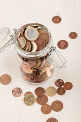 Euro coins in jar