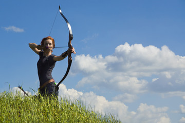 Archery woman bends bow archer target narrow - obrazy, fototapety, plakaty