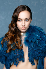 Fototapeta premium Beautiful young woman modern clothes posing in studio