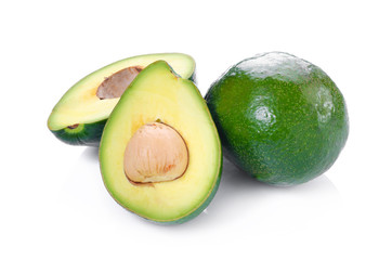 green avocados isolated on the white background