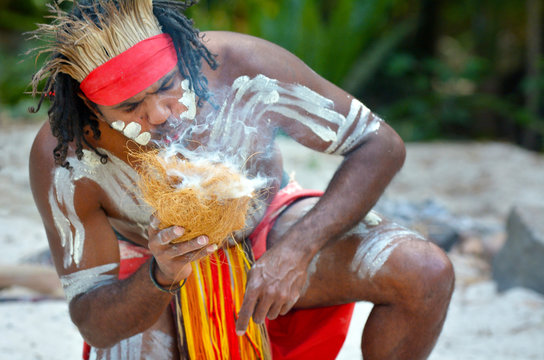 Yugambeh Aboriginal warrior man demonstrate fire making craf
