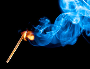 match bursting with incredible smoke cloud