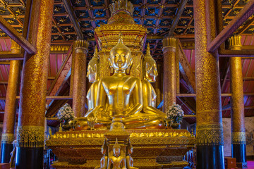Fototapeta premium Golden Buddha image in temple of Wat Phumin in Nan, Thailand