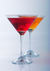 Cocktail in martini glass on white