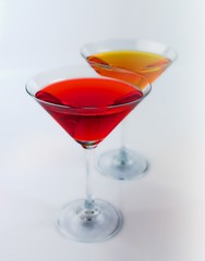 Cocktail in martini glass on white