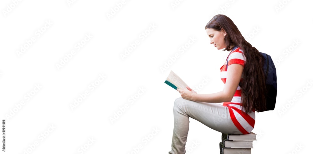 Poster composite image of student reading book in library