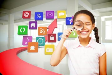 Composite image of little girl with magnifying glass