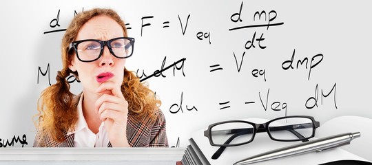 Composite image of geeky hipster woman thinking