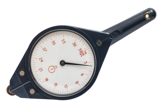 Old mechanical curvimeter  isolated on white background..A device for measuring the length of curves, such as on a map.