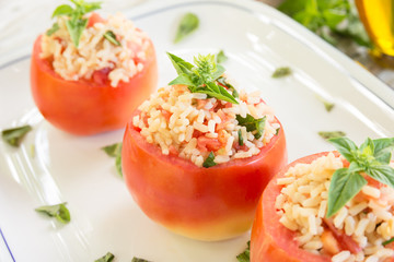 Tomato stuffed with rice, vegetarian food