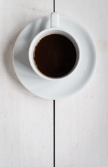 white cup coffee
