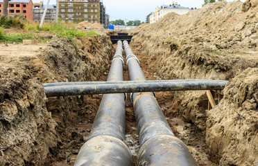 Installing the district heating pipe systems (Russia)