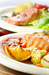 Fried salmon fillet with vegetables