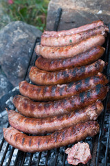 grilled sausages on the grill