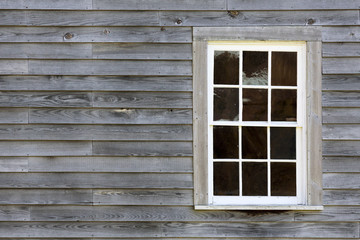 Fototapeta na wymiar rustic clapboard wall with window background