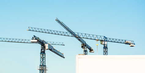 building cranes and billboard