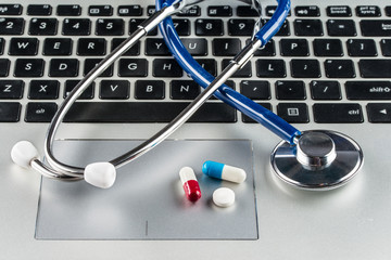 Pills and Stethoscope with notebook, Keyboard