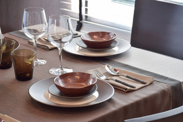 Close up modern classic dining set on wooden dining table