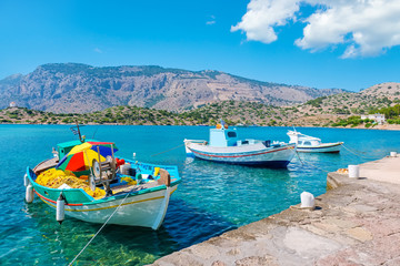 Fototapeta na wymiar Boats in harbour. Symi, Greece