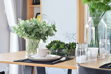 elegant table set in modern style dining room interior