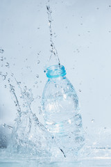 Bottle of drinking water splash