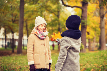 smiling children in autumn park