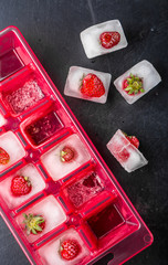 Ice cubes with strawberries