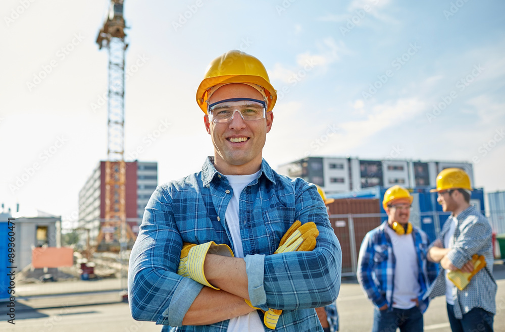 Sticker group of smiling builders in hardhats outdoors