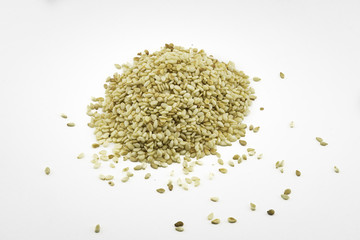 Sesame seeds on white background.