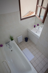 Nicely decorated modern white  washroom,