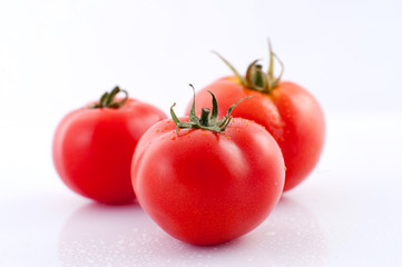 Tomatoes with drops of water