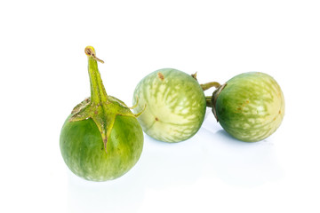 green tomatoes isolated on white background.