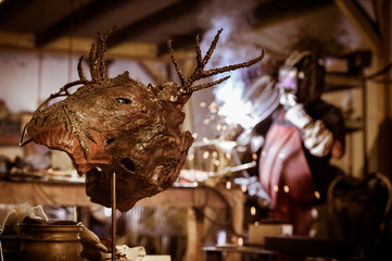 Metal worker standing in workshop