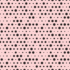 Cute pink and black dotted vector seamless pattern.