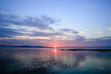 Obraz na płótnie Canvas sunset above the sea