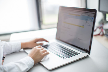  ..the laptop on the table