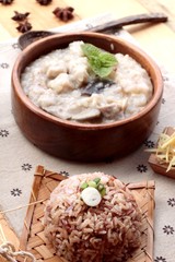 Brown rice porridge put pork and brown rice with soft-boiled egg