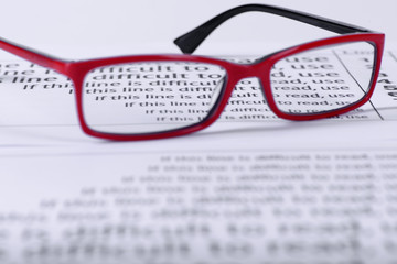 eyeglasses and eye chart