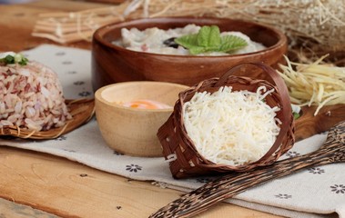 Brown rice porridge put pork and brown rice with soft-boiled egg