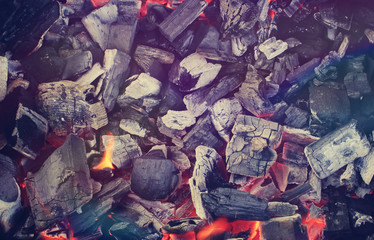 red embers in the grill, background