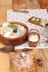Brown rice porridge put pork and brown rice with soft-boiled egg